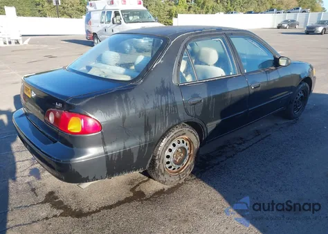 2001 Toyota Corolla Le z USA, uszkodzony, nr VIN 1NXBR12E71Z453244